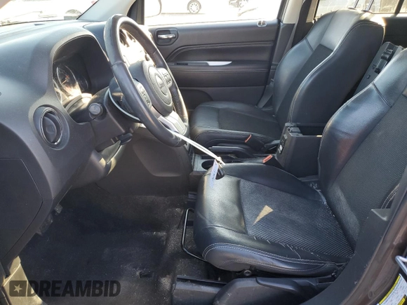 2015 Jeep Compass Latitude with VIN 1C4NJCEBXFD274712, listed as a Copart auction lot 41638375 with 142,684 mi miles and Salvage Title. Bid and sale history available at carsss.com. Image 7.