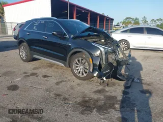 2021 Cadillac XT4 FWD Premium Luxury with VIN 1GYFZCR47MF000064, listed as a IAAI auction lot 41974115 with 1 mi miles. Bid and sale history available at carsss.com. Image 1.