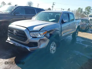 2017 Toyota Tacoma SR with VIN 5TFAX5GN2HX096442, listed as a IAAI auction lot 41667984 with 63,377 mi miles. Bid and sale history available at carsss.com. Image 2.