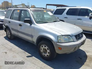 1999 Honda CR-V LX z VIN JHLRD1842XC011439, wystawiony jako IAAI lot #42544445 z przebiegiem 142 447 mil mil oraz . Historia ofert i sprzedaży dostępna na DreamBid. Obrazek 1.