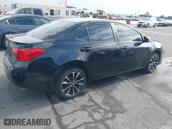 2019 Toyota Corolla L with VIN 5YFBURHE6KP892992, listed as a IAAI auction lot 42057187 with 80,304 mi miles and . Bid and sale history available at DreamBid. Image 4.