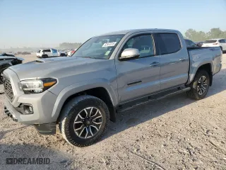 2021 Toyota Tacoma 2WD SR5 with VIN 5TFAZ5CN8MX107437, listed as a Copart auction lot 52557015 with NaN miles and Salvage Title. Bid and sale history available at carsss.com. Image 1.