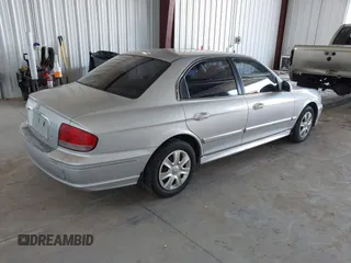 2002 Hyundai Sonata GLS with VIN KMHWF35H32A643718, listed as a IAAI auction lot 41668672 with 174,782 mi miles. Bid and sale history available at carsss.com. Image 4.