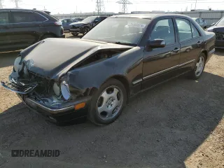 2002 Mercedes-Benz E-Class with VIN WDBJF70J22B489706, listed as a Copart auction lot 71109874 with 59,167 mi miles and Salvage Title. Bid and sale history available at carsss.com. Image 1.