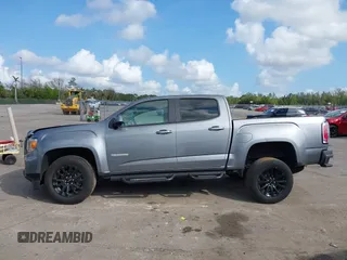 2021 GMC Canyon 2WD Elevation with VIN 1GTG5CEN6M1293098, listed as a IAAI auction lot 41477792 with 48,252 mi miles. Bid and sale history available at carsss.com. Image 14.
