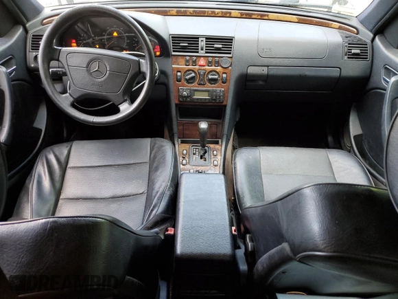 1999 Mercedes-Benz C 230/260/280/320 with VIN WDBHA24G4XA749633, listed as a Copart auction lot 56560105 with 221,306 mi miles and Salvage title. Bid and sale history available at DreamBid. Image 8.