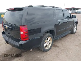 2007 Chevrolet Suburban LT with VIN 3GNFK16307G128456, listed as a IAAI auction lot 42374506 with 161,471 mi miles and . Bid and sale history available at DreamBid. Image 4.