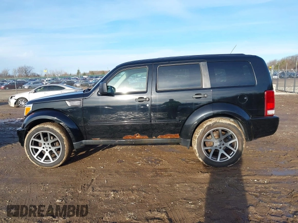 2007 Dodge Nitro SLT with VIN 1D8GT58K47W560542, listed as a IAAI auction lot 41218781 with 151,328 mi miles. Bid and sale history available at carsss.com. Image 14.