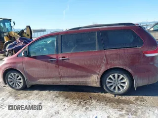 2014 Toyota Sienna XLE with VIN 5TDYK3DC5ES425818, listed as a IAAI auction lot 41421282 with 105,586 mi miles and . Bid and sale history available at DreamBid. Image 14.