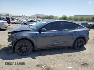 2023 Tesla Model Y Long Range z VIN 7SAYGDEE7PA166103, wystawiony jako Copart lot #54651175 z przebiegiem 38 928 mil mil oraz Szkoda całkowita • Salvage title. Historia ofert i sprzedaży dostępna na DreamBid. Obrazek 1.