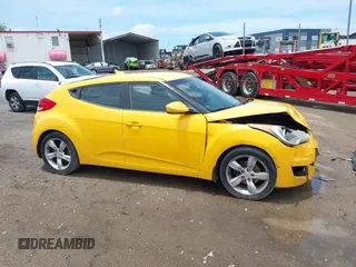 2012 Hyundai Veloster w/Black Int with VIN KMHTC6AD5CU046702, listed as a IAAI auction lot 42245379 with 136,327 mi miles and . Bid and sale history available at DreamBid. Image 13.