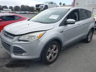 2015 Ford Escape SE with VIN 1FMCU0G95FUC81490, listed as a IAAI auction lot 42136791 with 140,967 mi miles. Bid and sale history available at carsss.com. Image 2.