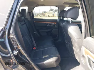 2021 Honda CR-V Touring with VIN 2HKRW2H96MH681908, listed as a IAAI auction lot 42082535 with 65,570 mi miles and . Bid and sale history available at DreamBid. Image 8.