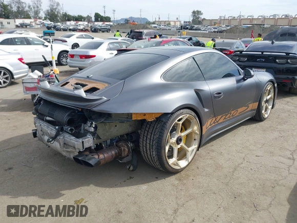 2015 Porsche 911 Turbo S with VIN WP0AD2A92FS166616, listed as a IAAI auction lot 41688055 with 38,345 mi miles. Bid and sale history available at carsss.com. Image 4.