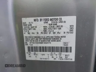 2011 Ford F-150 XL with VIN 1FTEX1EM9BFA54173, listed as a IAAI auction lot 42009894 with 149,710 mi miles. Bid and sale history available at carsss.com. Image 9.