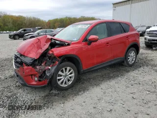 2016 Mazda CX-5 Touring z VIN JM3KE4CY3G0876940, wystawiony jako Copart lot #53953795 z przebiegiem 111 371 mil mil oraz Szkoda całkowita • Salvage title. Historia ofert i sprzedaży dostępna na DreamBid. Obrazek 1.
