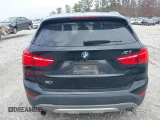 2017 BMW X1 sDrive28i with VIN WBXHU7C36HP924874, listed as a IAAI auction lot 41368396 with 113,443 mi miles. Bid and sale history available at carsss.com. Image 15.