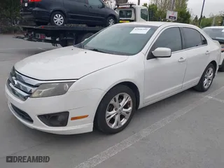 2012 Ford Fusion SE with VIN 3FAHP0HA1CR213951, listed as a IAAI auction lot 42046104 with 163,511 mi miles. Bid and sale history available at carsss.com. Image 2.