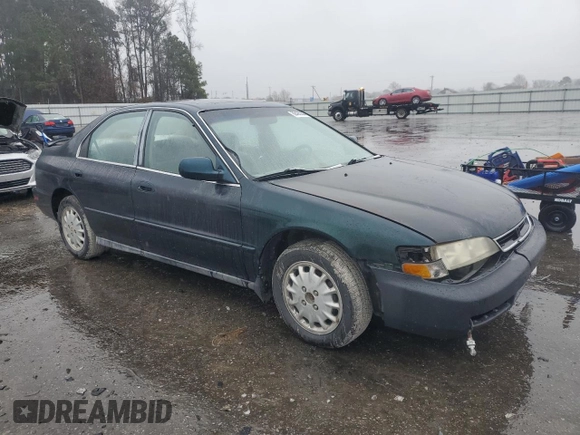 1996 Honda Accord EX with VIN 1HGCD5656TA174575, listed as a Copart auction lot 86435334 with 217,784 mi miles and Salvage Title. Bid and sale history available at DreamBid. Image 4.