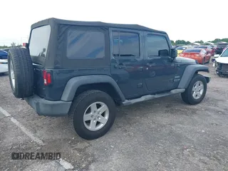 2018 Jeep Wrangler JK Unlimited Sport with VIN 1C4BJWDG5JL858936, listed as a IAAI auction lot 39953617 with 75,865 mi miles. Bid and sale history available at carsss.com. Image 4.