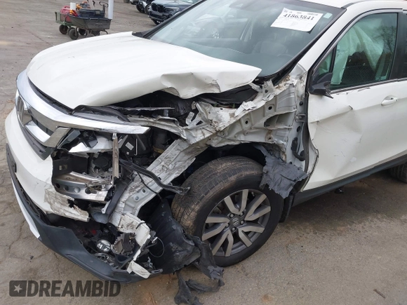 2019 Honda Pilot EX-L with VIN 5FNYF6H59KB075577, listed as a IAAI auction lot 41863841 with 102,242 mi miles and . Bid and sale history available at carsss.com. Image 6.