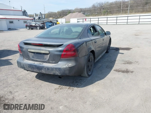 2008 Pontiac Grand Prix z VIN 2G2WP552281113384, wystawiony jako IAAI lot #41989008 z przebiegiem 242 354 mil mil oraz . Historia ofert i sprzedaży dostępna na DreamBid. Obrazek 4.
