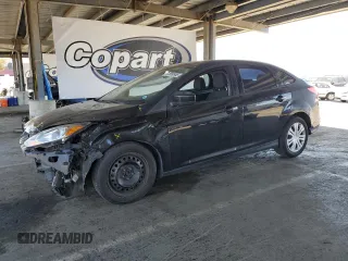 2012 Ford Focus SE with VIN 1FAHP3F25CL293041, listed as a Copart auction lot 58069955 with 127,129 mi miles and Salvage title. Bid and sale history available at DreamBid. Image 1.