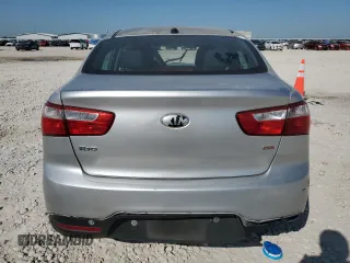 2014 Kia Rio LX with VIN KNADM4A30E6329515, listed as a Copart auction lot 52415295 with 231,991 mi miles and Salvage Title. Bid and sale history available at DreamBid. Image 6.
