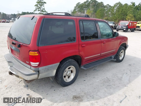 1999 Ford Explorer XLT with VIN 1FMDU34E6XZA35804, listed as a IAAI auction lot 41751506 with 192,302 mi miles and . Bid and sale history available at DreamBid. Image 4.