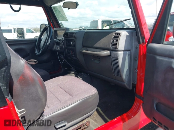 2002 Jeep Wrangler X with VIN 1J4FA39S02P739211, listed as a IAAI auction lot 41665910 with 144,118 mi miles. Bid and sale history available at carsss.com. Image 5.