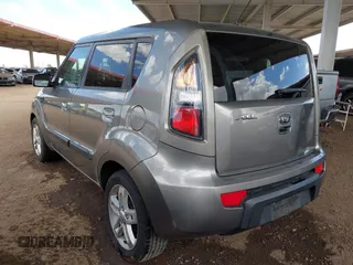 2010 Kia Soul + with VIN KNDJT2A28A7163141, listed as a IAAI auction lot 42035132 with 211,661 mi miles. Bid and sale history available at carsss.com. Image 3.