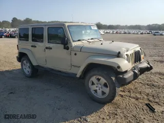 2011 Jeep Wrangler Unlimited Sahara with VIN 1J4BA5H10BL558961, listed as a Copart auction lot 74806494 with 172,855 mi miles and Salvage Title. Bid and sale history available at carsss.com. Image 4.