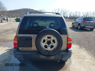 2002 Chevrolet Tracker with VIN 2CNBJ13C026911257, listed as a IAAI auction lot 41760465 with 135,549 mi miles and . Bid and sale history available at DreamBid. Image 17.