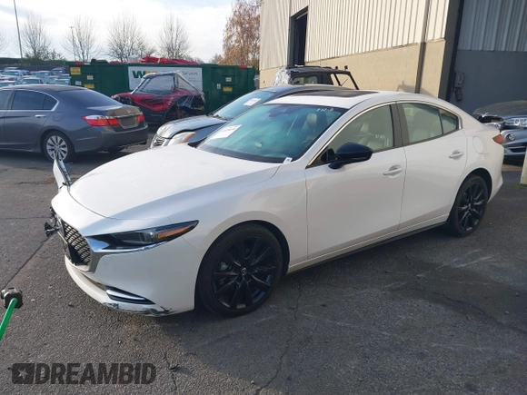 2022 Mazda 3 2.5 Turbo with VIN 3MZBPBAY2NM311824, listed as a IAAI auction lot 41038030 with 21,669 mi miles and . Bid and sale history available at DreamBid. Image 23.