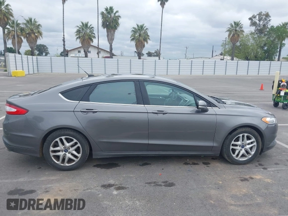 2014 Ford Fusion SE with VIN 3FA6P0H75ER299490, listed as a IAAI auction lot 42055604 with 134,078 mi miles. Bid and sale history available at carsss.com. Image 13.