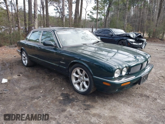 2003 Jaguar XJ with VIN SAJDA15B53MF53212, listed as a IAAI auction lot 41613266 with 180,165 mi miles and . Bid and sale history available at DreamBid. Image 1.