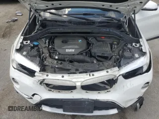 2018 BMW X1 xDrive28i with VIN WBXHT3C35J5F90062, listed as a Copart auction lot 56284945 with 138,137 mi miles and Salvage title. Bid and sale history available at DreamBid. Image 11.