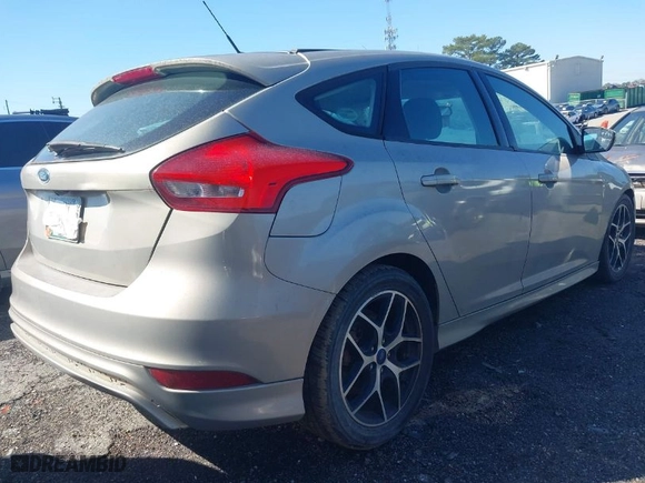 2015 Ford Focus SE with VIN 1FADP3K27FL247736, listed as a IAAI auction lot 41739772 with 149,165 mi miles. Bid and sale history available at carsss.com. Image 4.