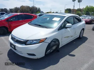 2012 Honda Civic EX-L with VIN 19XFB2F92CE381075, listed as a IAAI auction lot 42024543 with 102,703 mi miles and . Bid and sale history available at DreamBid. Image 2.