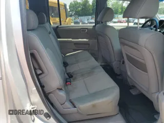 2009 Honda Pilot LX with VIN 5FNYF48259B040040, listed as a Copart auction lot 59860445 with 213,459 mi miles and Salvage title. Bid and sale history available at DreamBid. Image 11.