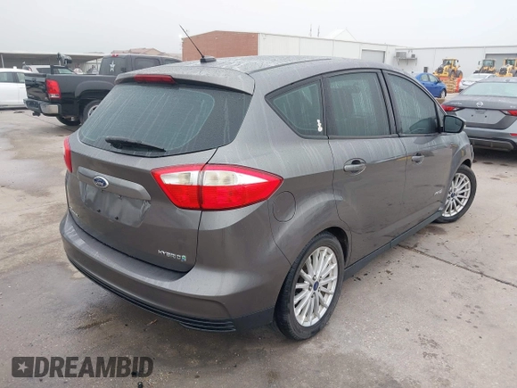 2013 Ford C-Max SE with VIN 1FADP5AUXDL535889, listed as a IAAI auction lot 42161407 with 103,978 mi miles and . Bid and sale history available at DreamBid. Image 4.