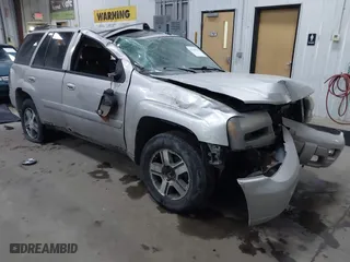 2005 Chevrolet TrailBlazer LT with VIN 1GNDT13SX52357796, listed as a IAAI auction lot 41510963 with 218,766 mi miles. Bid and sale history available at carsss.com. Image 1.