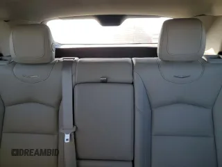 2023 Cadillac XT4 AWD Luxury with VIN 1GYFZBR42PF107893, listed as a Copart auction lot 74989124 with 9,579 mi miles and Salvage Title. Bid and sale history available at carsss.com. Image 10.