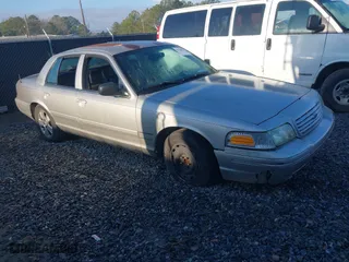 2005 Ford Crown Victoria LX with VIN 2FAFP74W95X166416, listed as a IAAI auction lot 41526872 with 195,589 mi miles. Bid and sale history available at carsss.com. Image 1.