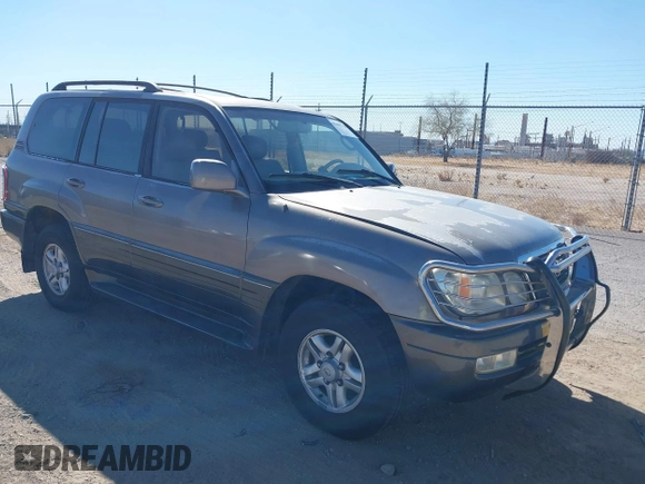 2000 Lexus LX 470 with VIN JT6HT00WXY0079873, listed as a IAAI auction lot 41605770 with 302,758 mi miles and . Bid and sale history available at DreamBid. Image 1.