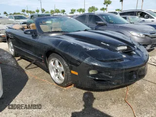 2001 Pontiac Firebird Trans Am z VIN 2G2FV32G812134704, wystawiony jako Copart lot #74893594 z przebiegiem Nie podano mil oraz Nie do naprawy • Non repairable. Historia ofert i sprzedaży dostępna na DreamBid. Obrazek 4.