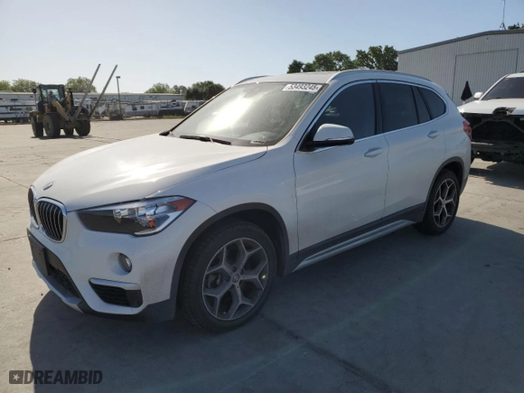 2019 BMW X1 xDrive28i with VIN WBXHT3C53K5L35670, listed as a Copart auction lot 53493245 with 14,201 mi miles and Salvage Title. Bid and sale history available at carsss.com. Image 1.
