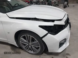2015 Infiniti Q50 z VIN JN1BV7ARXFM409367, wystawiony jako IAAI lot #41912056 z przebiegiem 126 382 mil mil oraz . Historia ofert i sprzedaży dostępna na DreamBid. Obrazek 17.