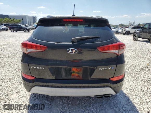 2017 Hyundai Tucson Value z VIN KM8J33A25HU285145, wystawiony jako Copart lot #53126025 z przebiegiem 89 912 mil mil oraz Szkoda całkowita • Salvage title. Historia ofert i sprzedaży dostępna na DreamBid. Obrazek 6.