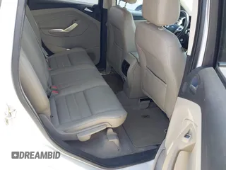 2013 Ford Escape SEL z VIN 1FMCU0H94DUD22476, wystawiony jako IAAI lot #42673808 z przebiegiem 215 811 mil mil oraz . Historia ofert i sprzedaży dostępna na DreamBid. Obrazek 8.